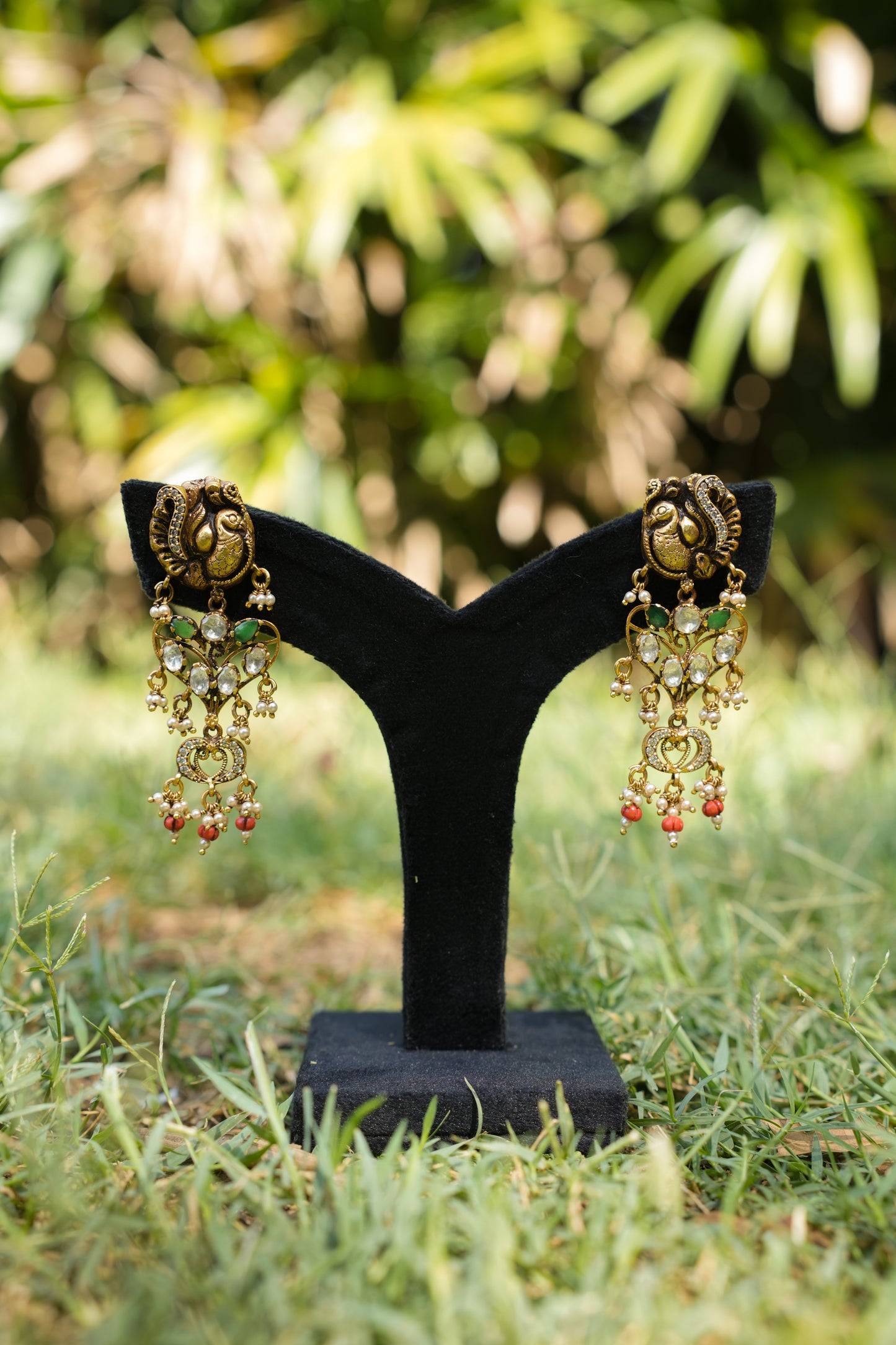 Sringaar Peacock stud green and coral earrings image 0