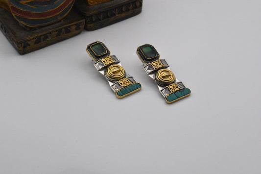Green Doublet With Turquois Ear Rings image 0
