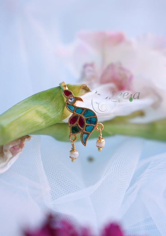 Turquoise and red bird bugadi