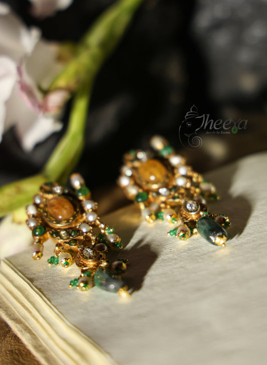 Big yellow stud with greeen bead