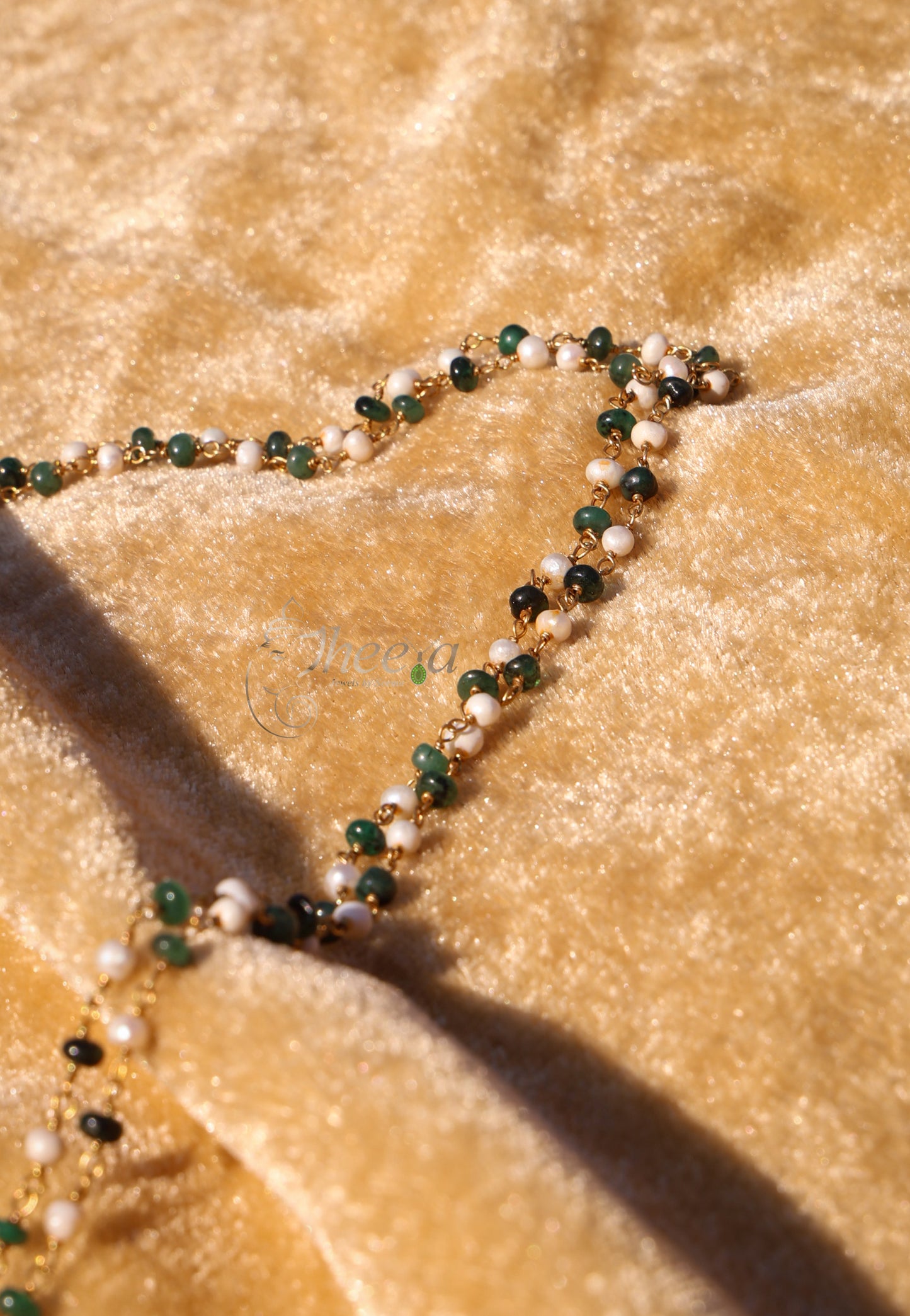 Green kundan pendant with green white beads