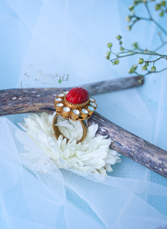Carved coral ring with moissanite
