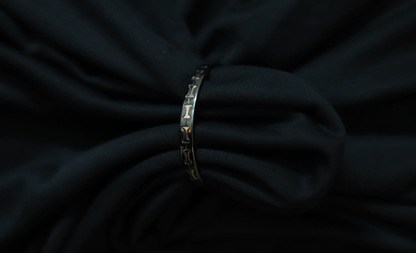 Men's styling featuring the black with rose gold bow design