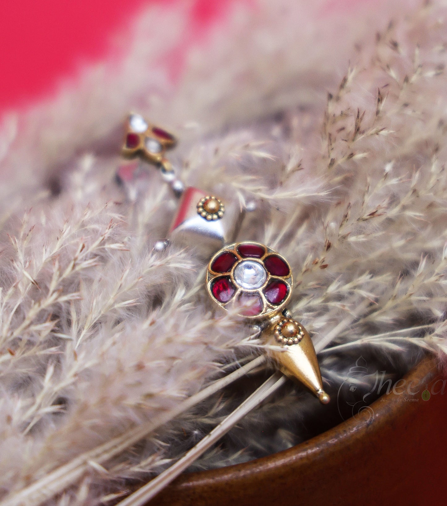 Dual tone red kundan earrings