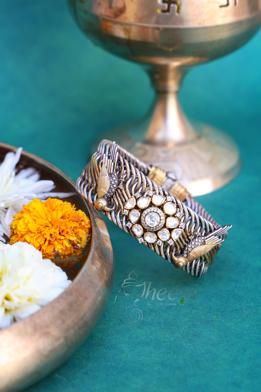 Dual tone Jalebi Bangle with birds and moissanite