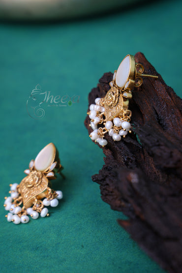 White and gold pear drop earrings