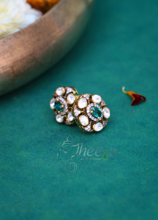 Green and moissanaite studs