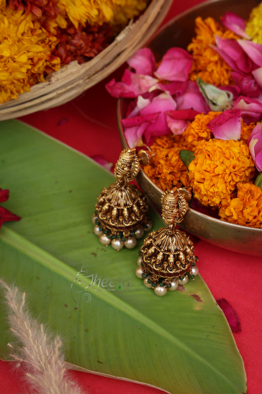 Shivanjali Antique Nakshi Jhumkas in Pure Silver, front view.