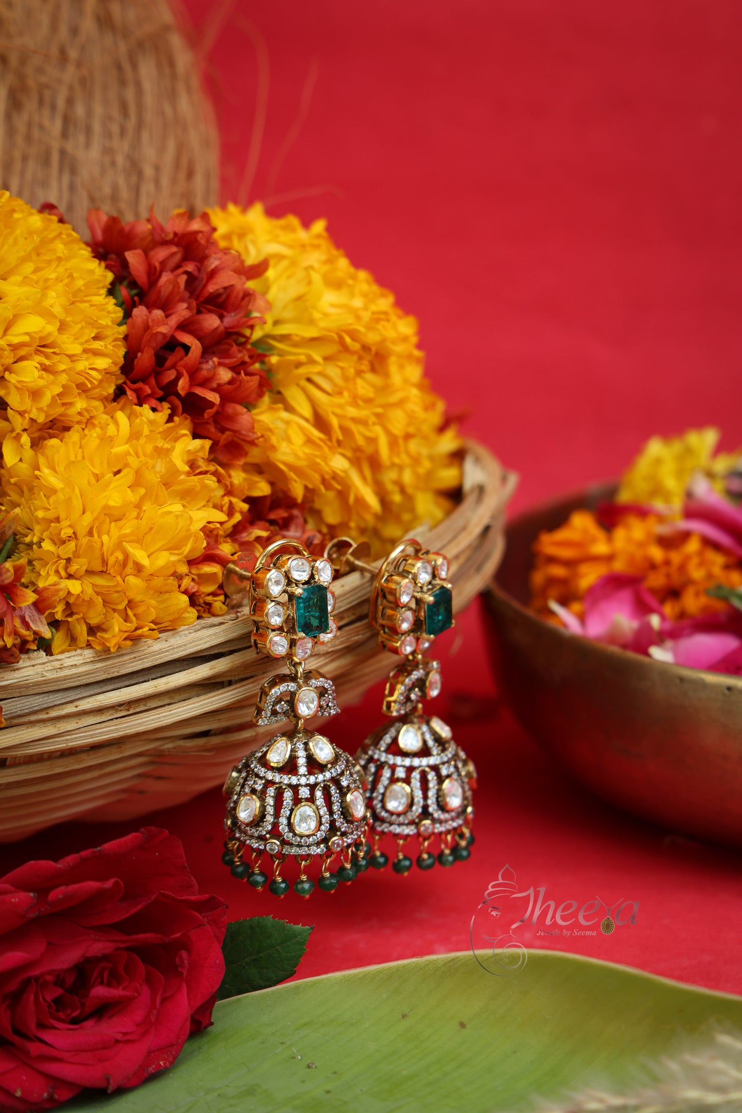 Zeenat Chand Green Square Jhumka worn by a model showcasing scale and Earrings design.