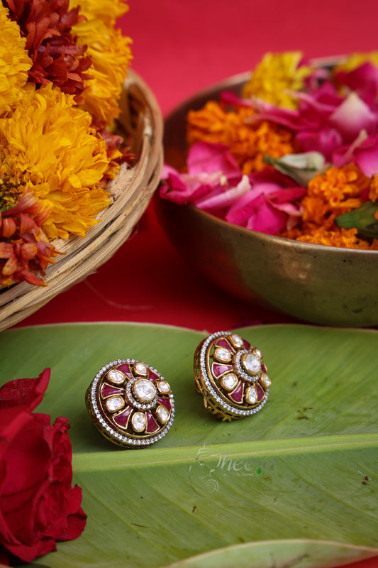 Kundan Petals Red Moissanite Studs in Pure Silver with ruby red accents, front view.