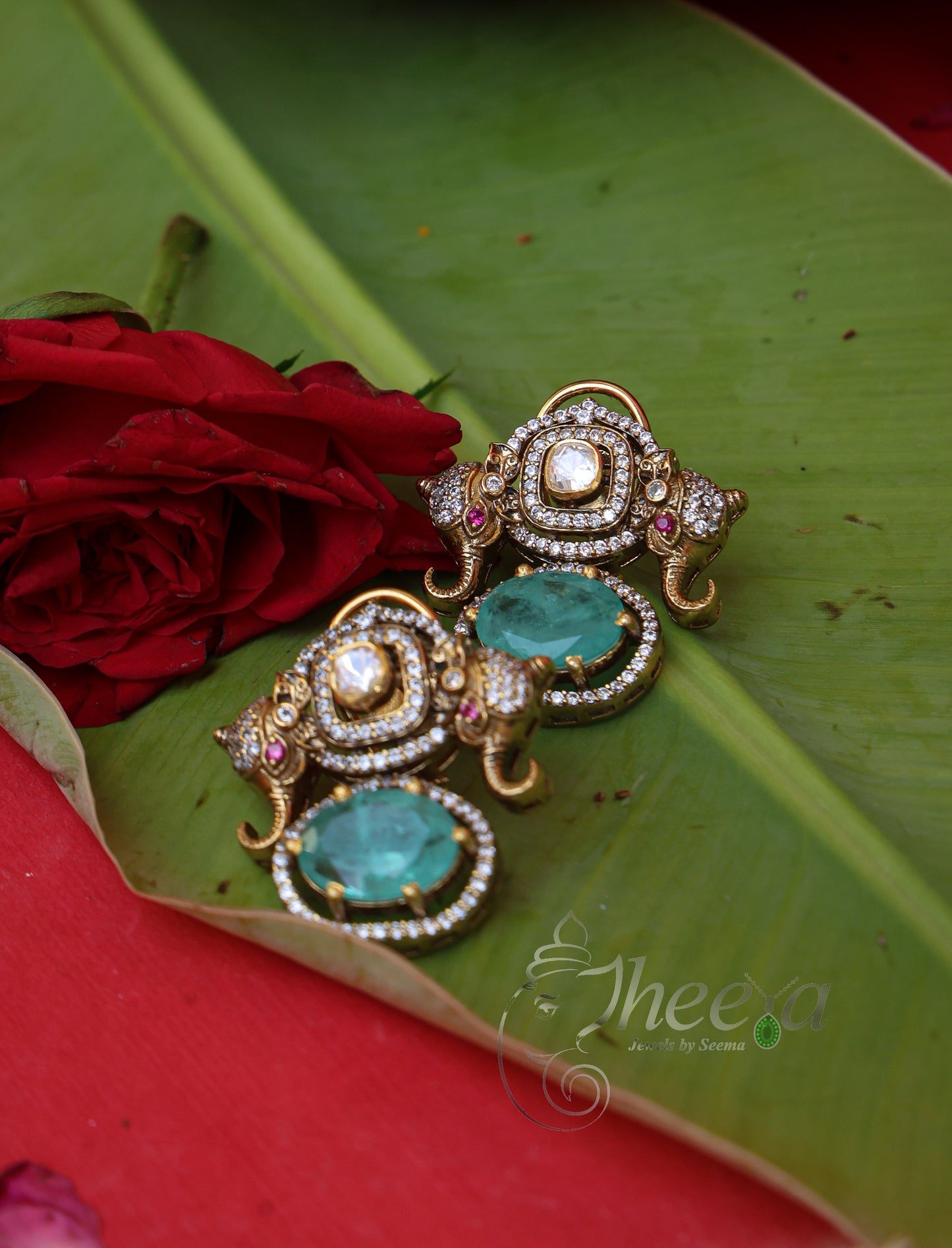 Close-up detailing of Rajkumari Mini Mint Elephant Studs highlighting Moissanite craftsmanship.
