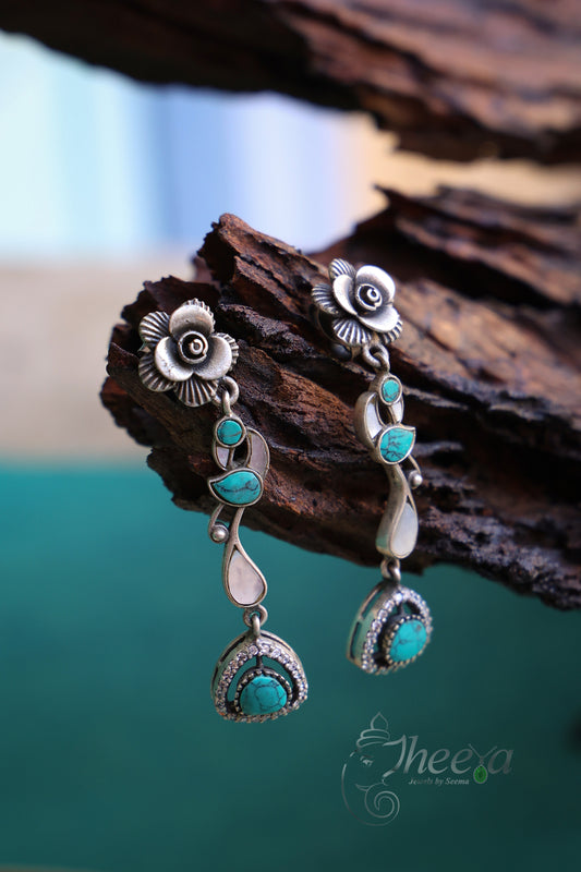 Turquoise silver tone earring