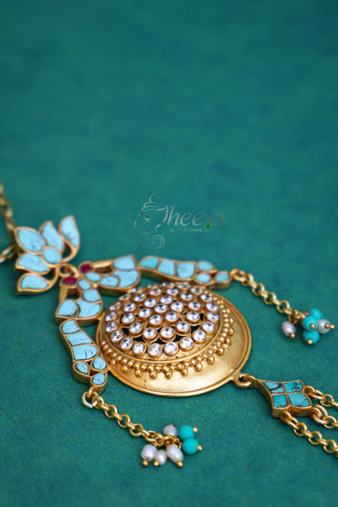 Turquoise gold tone pendant