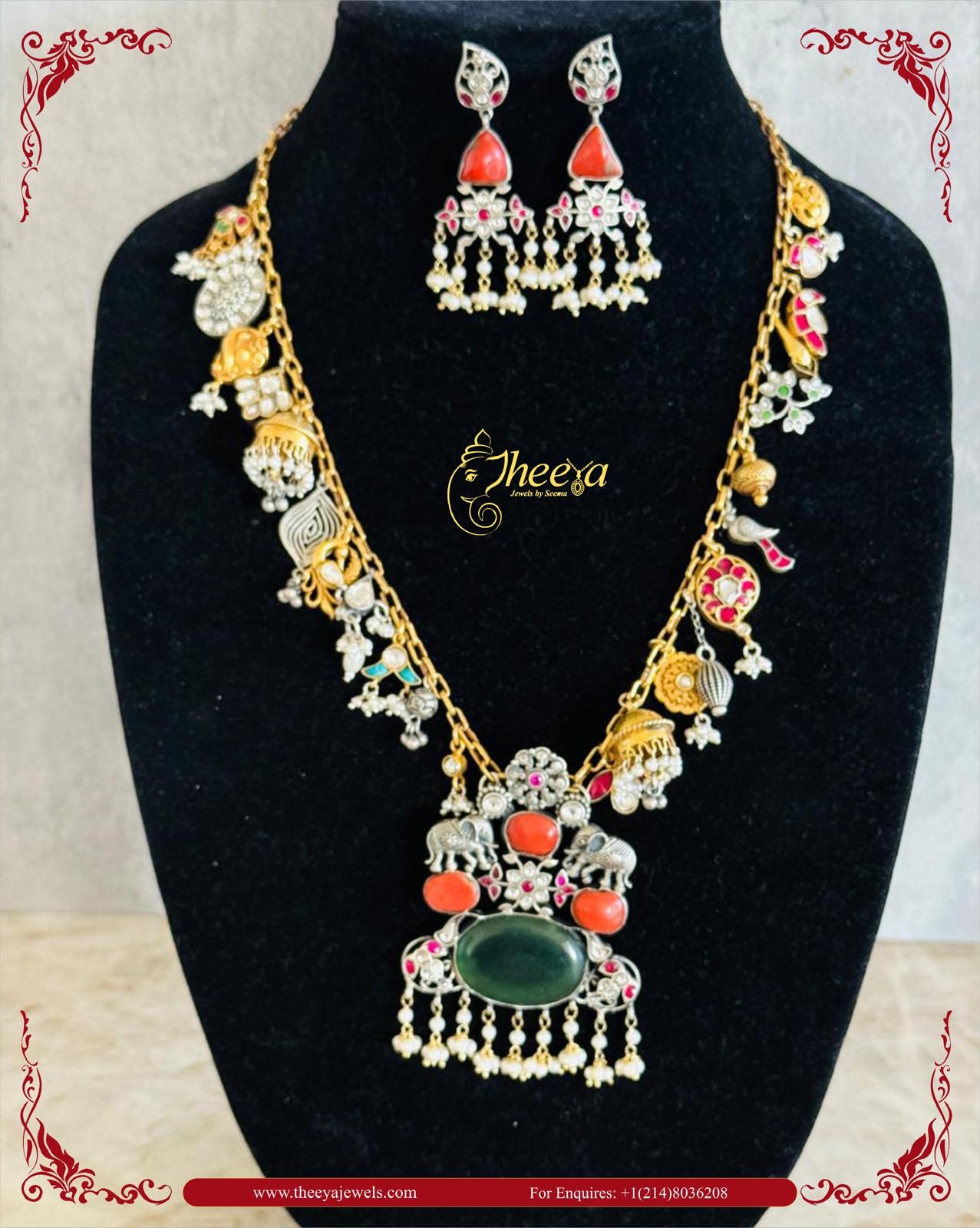 Dual tone charm necklace set with elephant pendant