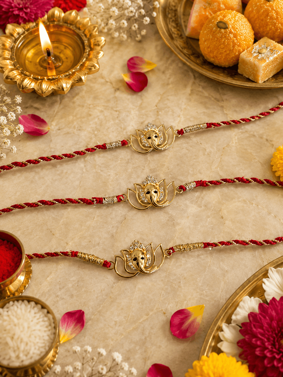 Gold Tone Stone Ganesha Rakhi