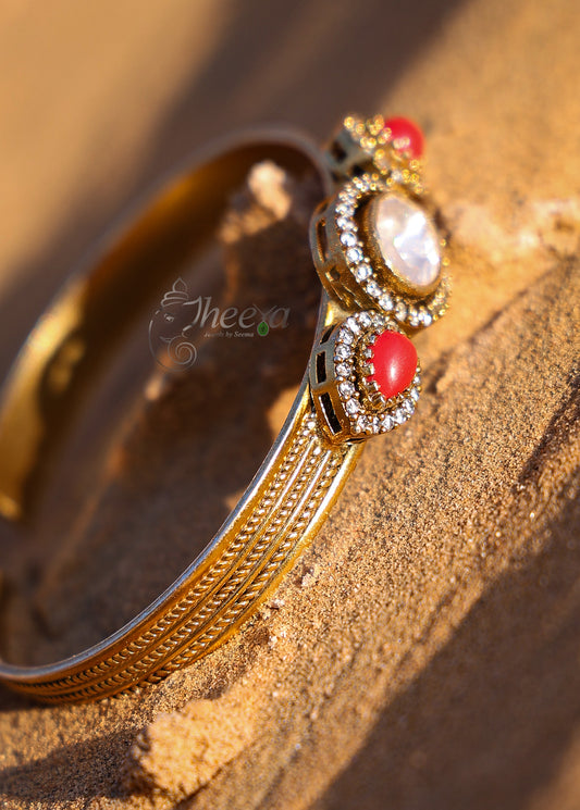 white and coral moissanaite bangle