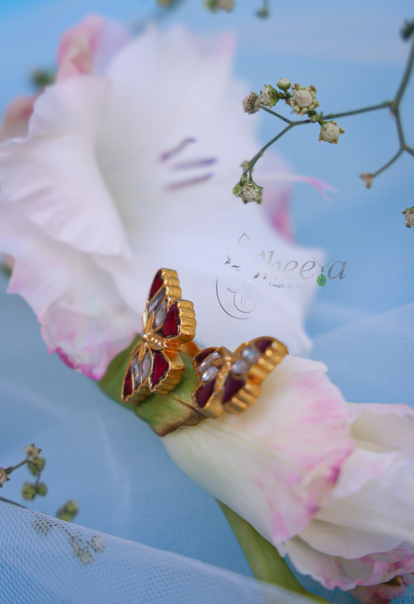 Red and white butterfly bugadi