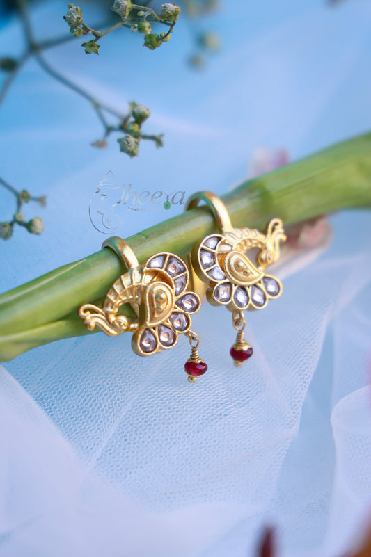 White stone peacock with red bead bugadi