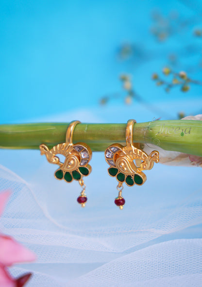 Green stone peacock with red bead bugadi