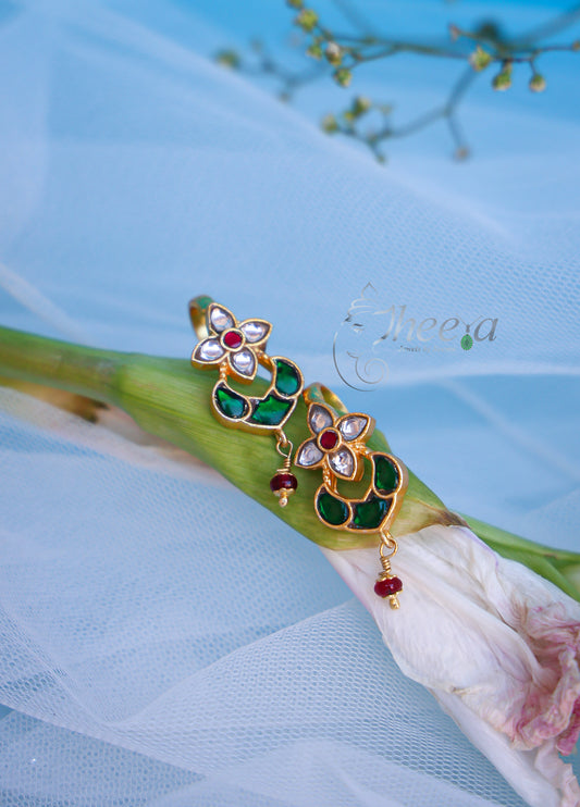 White flower with green bugadi