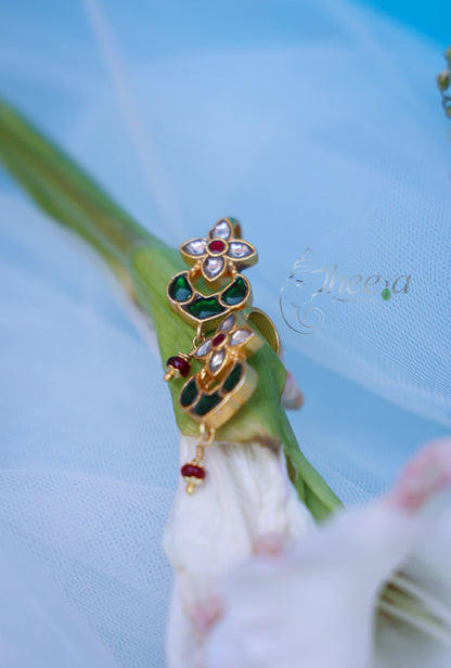 White flower with green bugadi