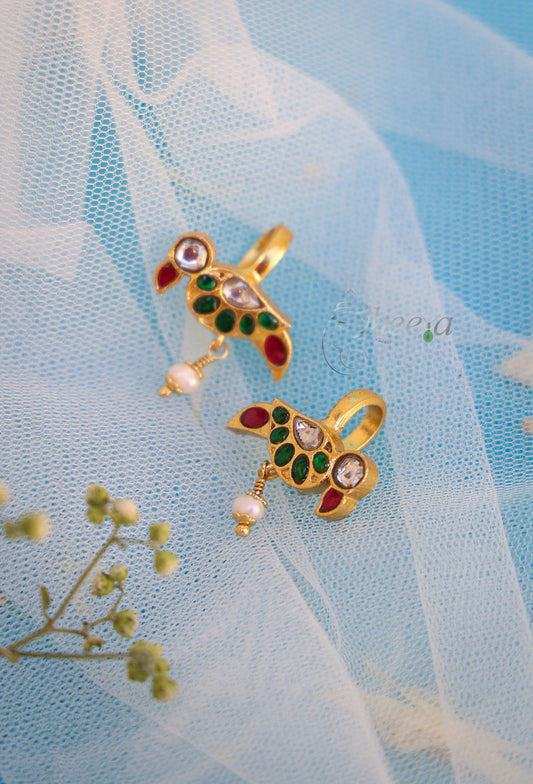 Green bird with red drop bugadi