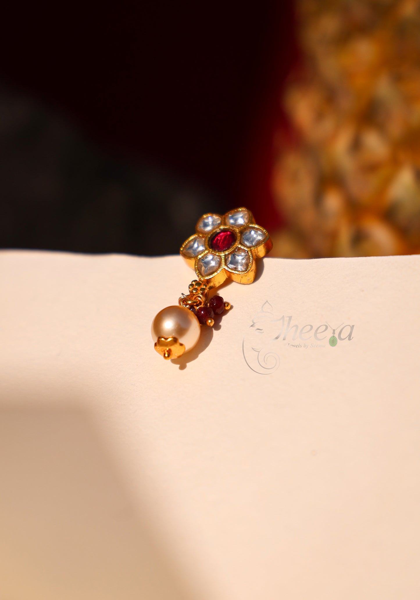 White Kundan stud with pear drop