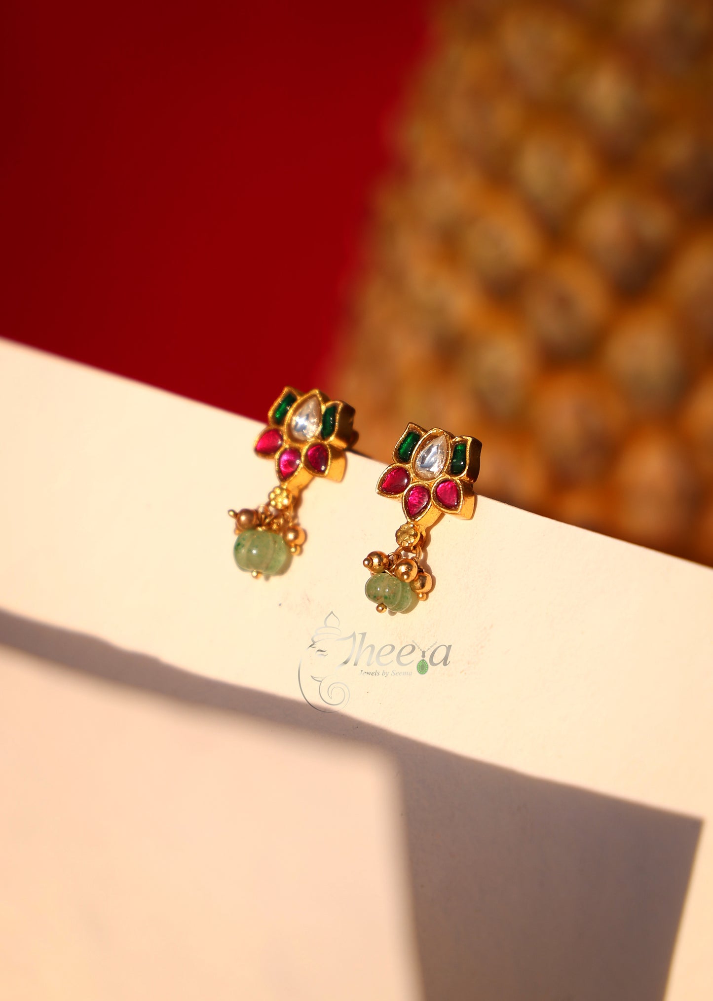 Multi color Lotus with green pumpkin drop