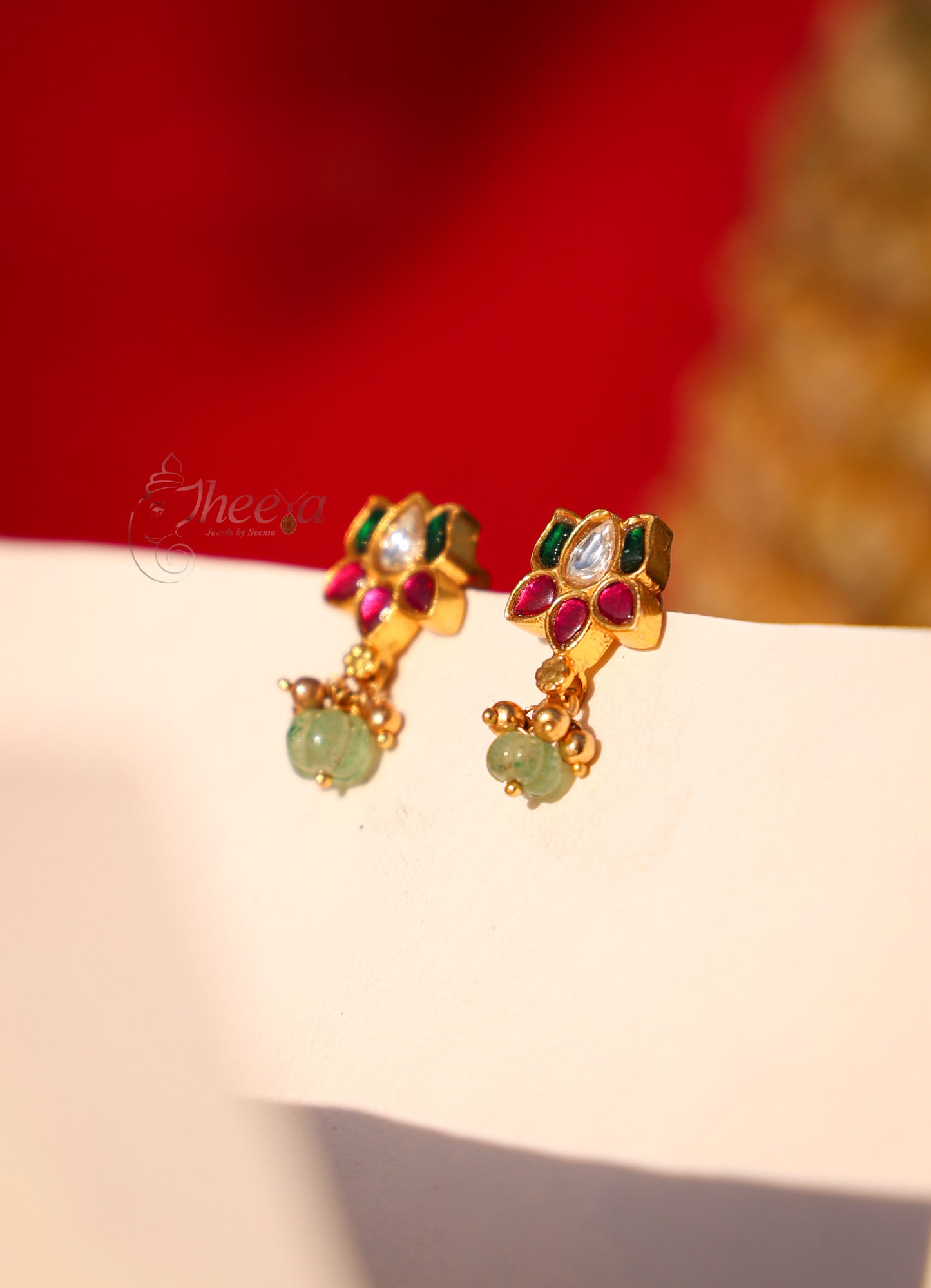 Multi color Lotus with green pumpkin drop