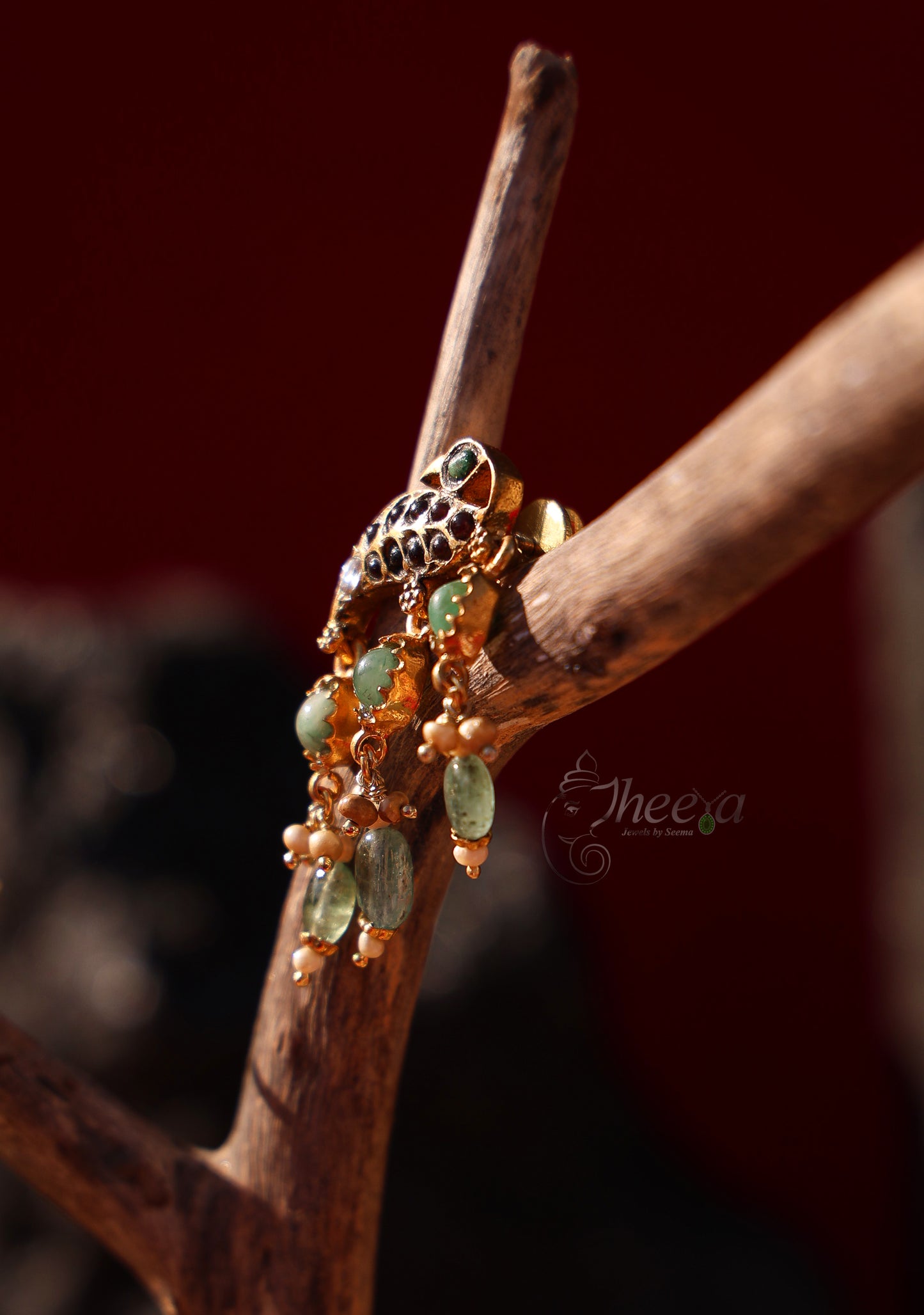 Small jadao peacock earring with green beads