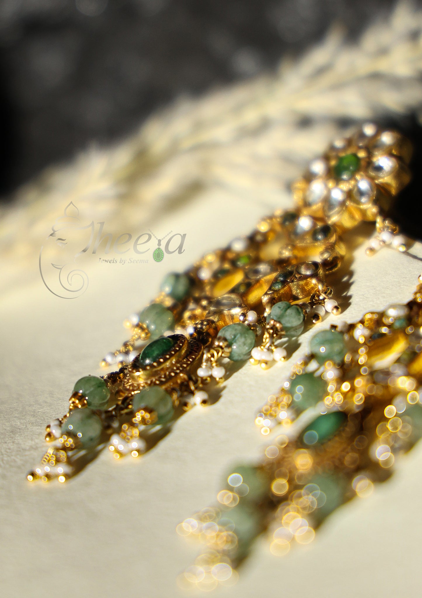 White flower stud in jadao kundan with green beada