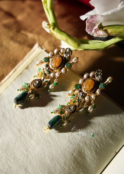 Big yellow stud with greeen bead