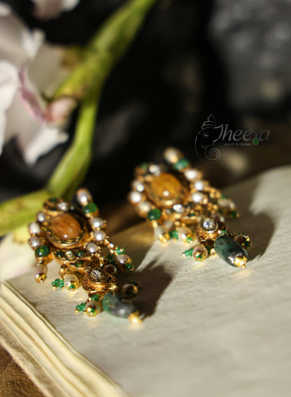 Big yellow stud with greeen bead