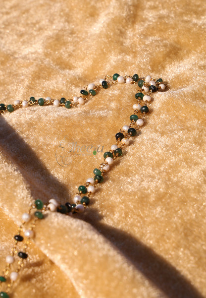 Green kundan pendant with green white beads