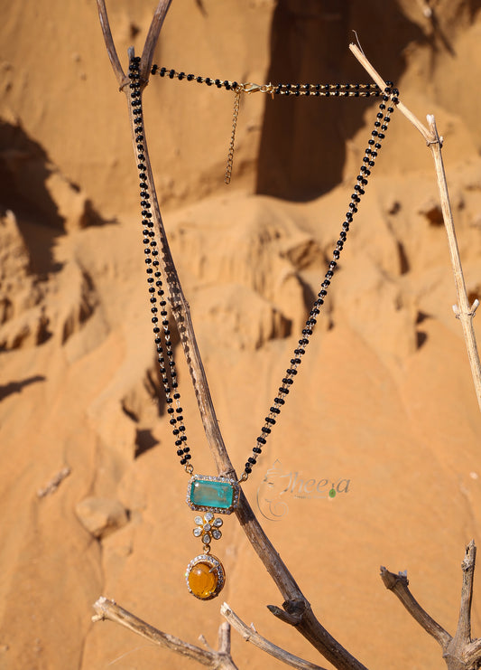 Green n yellow pendant black beads