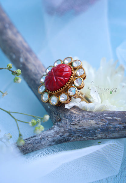 Carved coral ring with moissanite