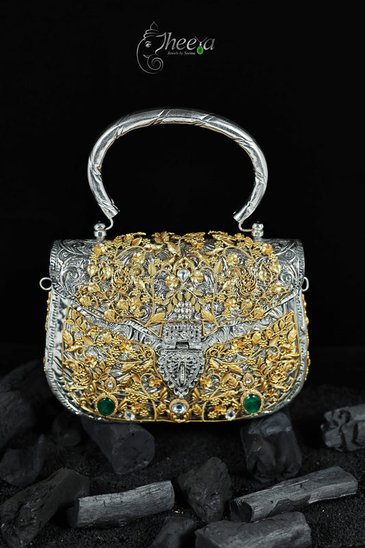 Royal Brass bag with gold plated carving with moissaniates