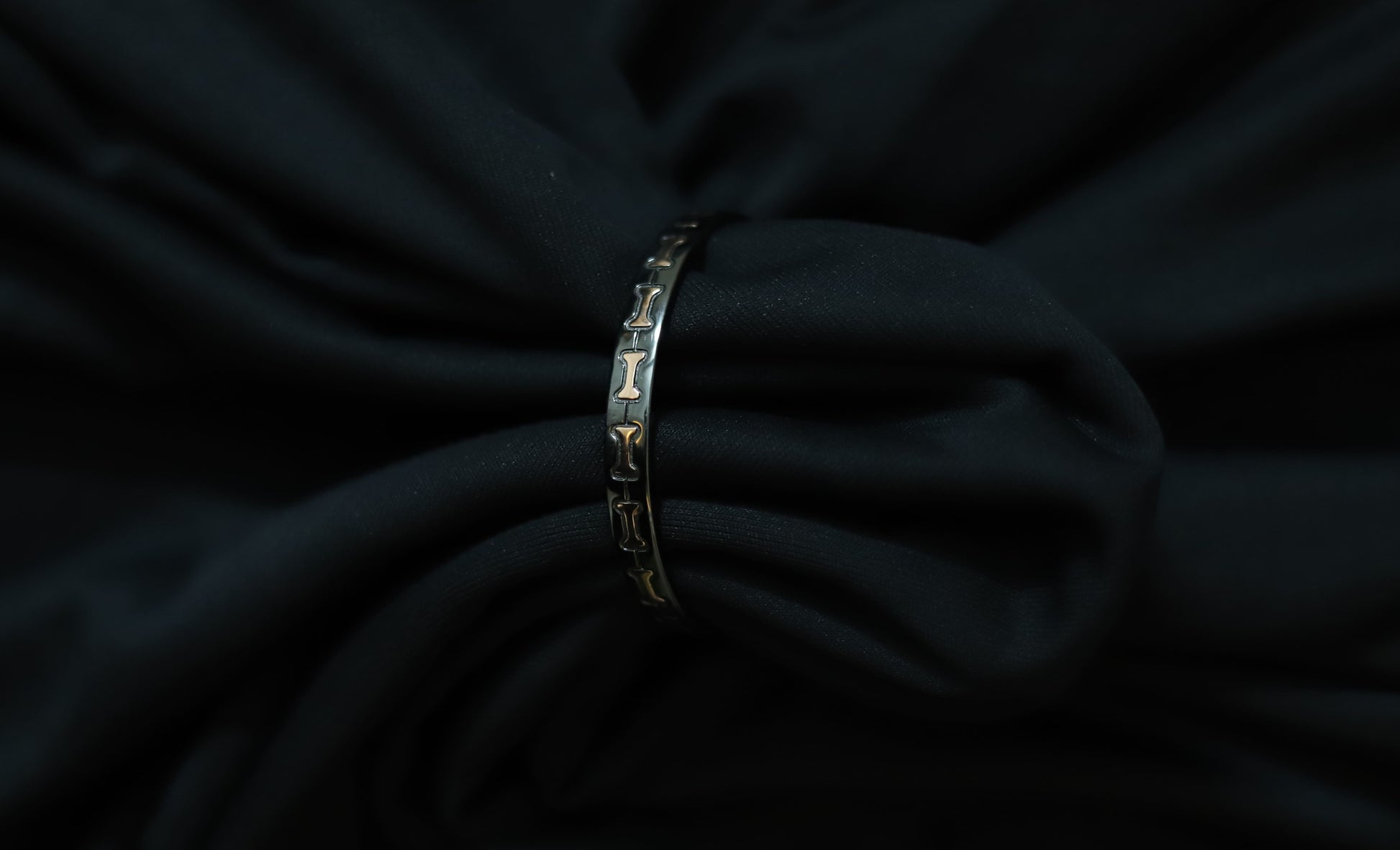Men's styling featuring the black with rose gold bow design