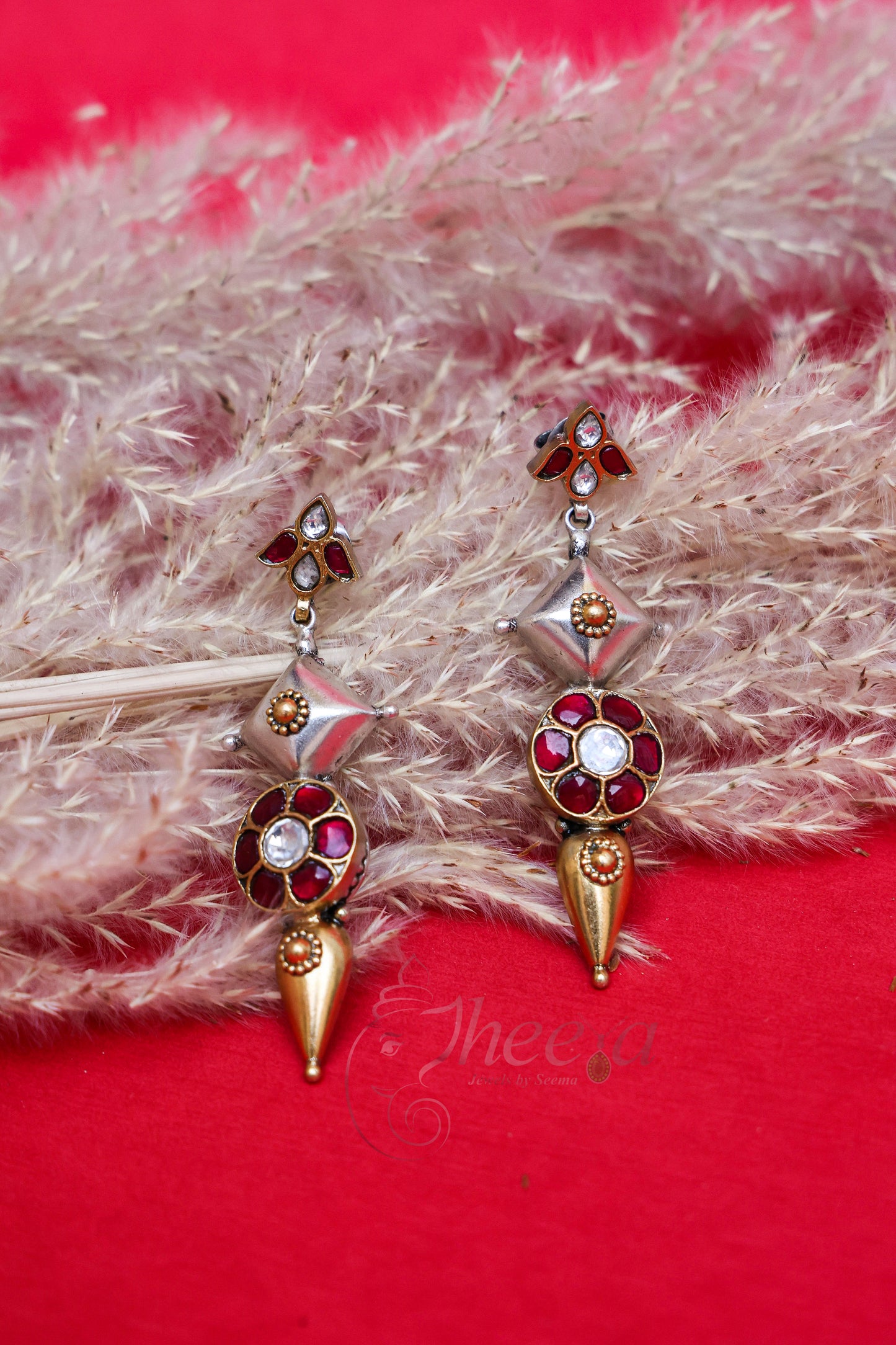 Dual tone red kundan earrings