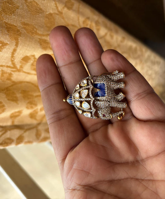 Gajgamini Blue Elephant Brooch worn by a model showcasing scale and Brooch design.