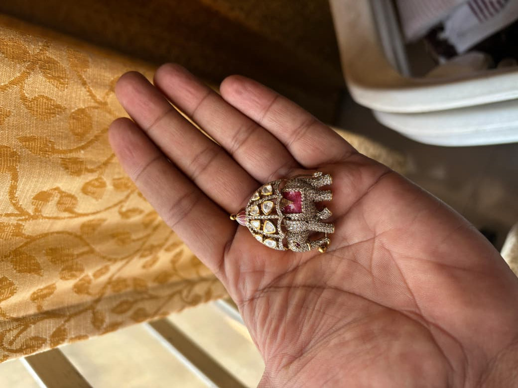 Rajputana Red Elephant Brooch worn by a model showcasing scale and Brooch design