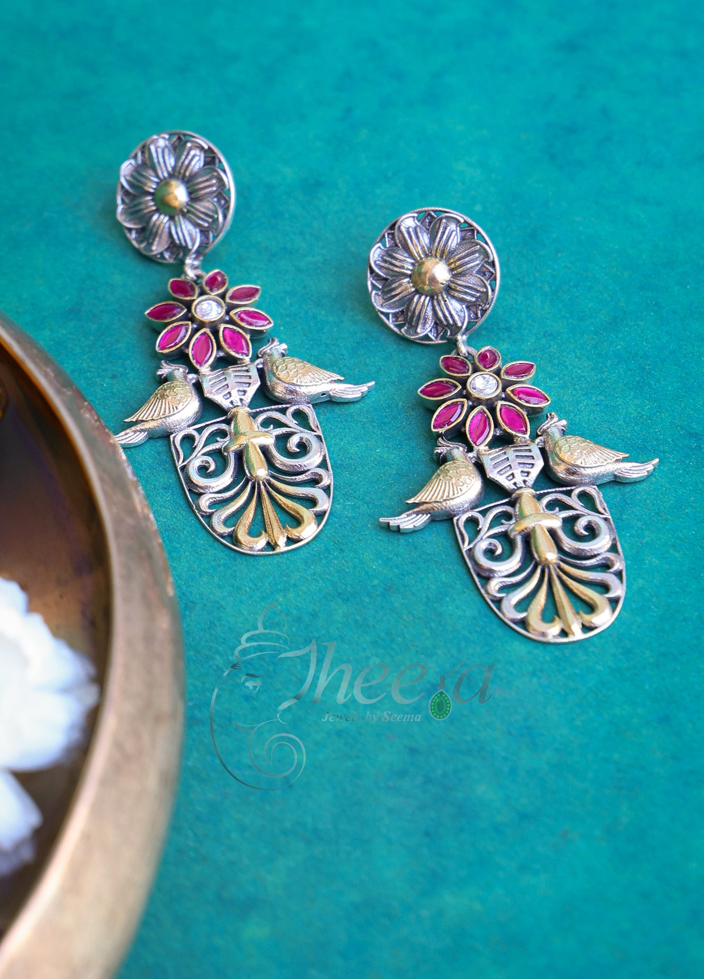Dual tone twin bird earrings