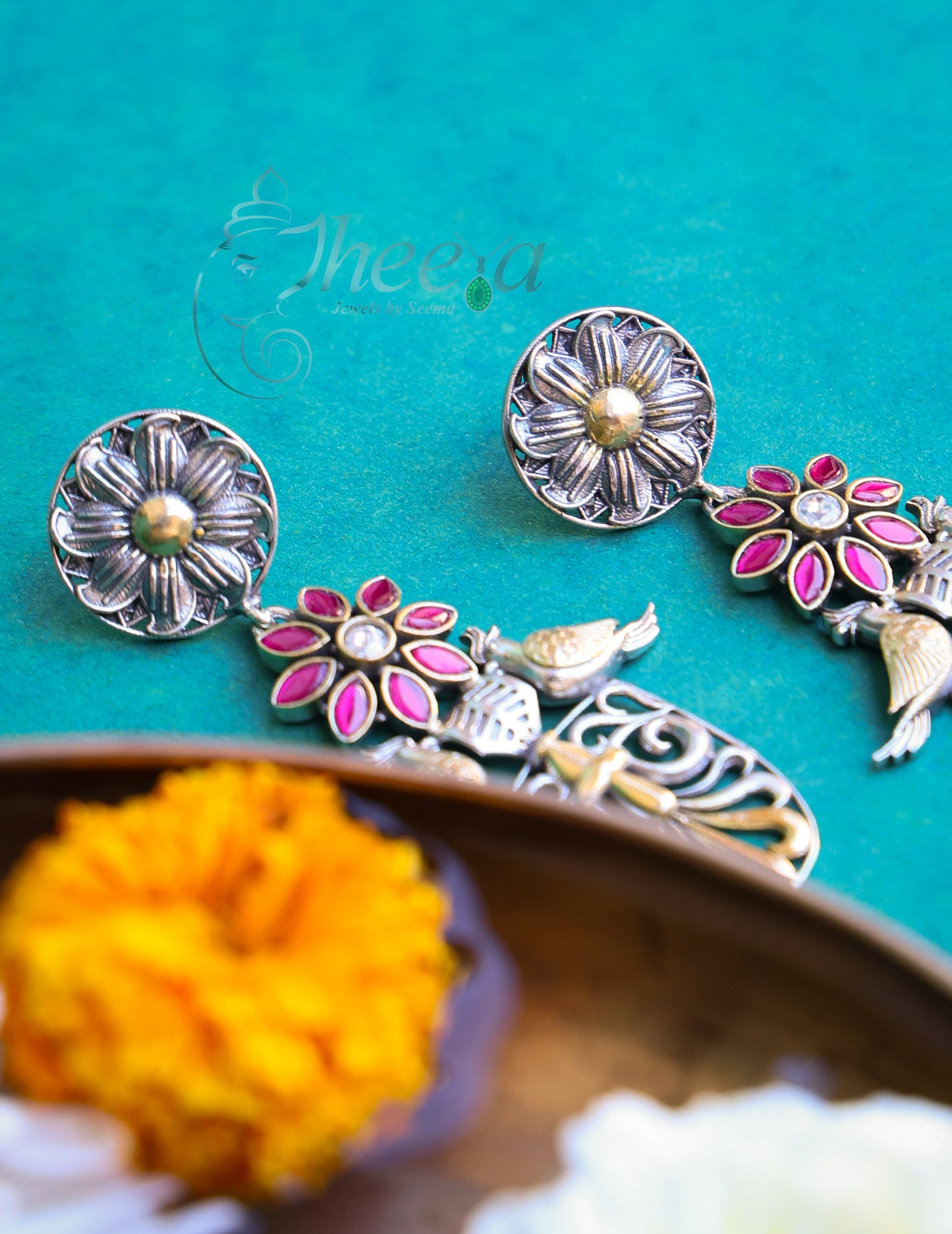 Dual tone twin bird earrings