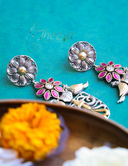 Dual tone twin bird earrings