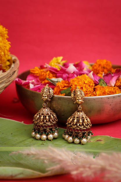 Shivanjali Antique Nakshi Jhumkas worn by a model showcasing scale and Earrings design.