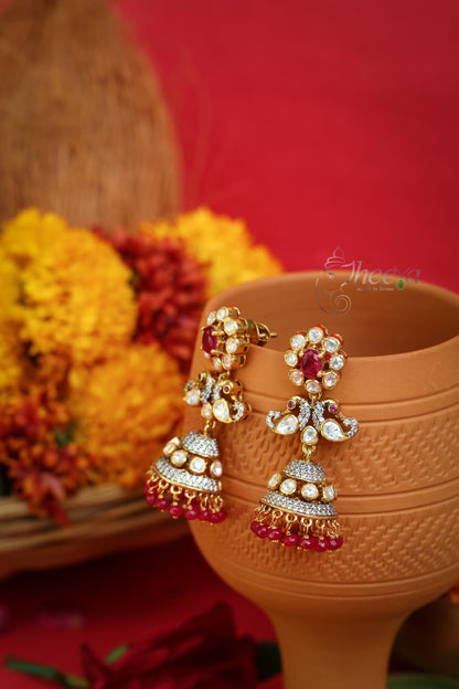Gulnaar Shine Red Flower Jhumkas worn by a model showcasing scale and Earrings design.