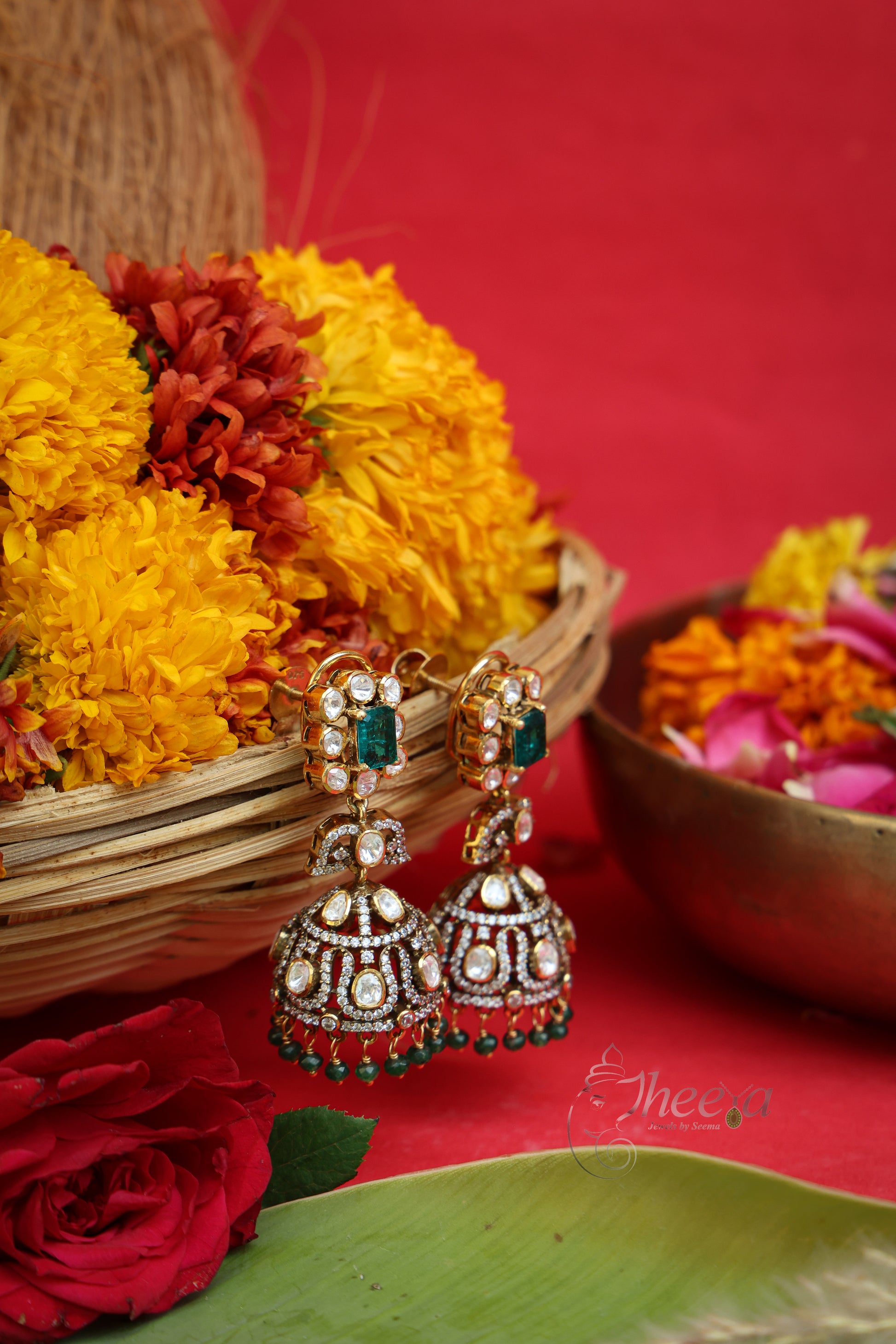 Zeenat Chand Green Square Jhumka worn by a model showcasing scale and Earrings design.
