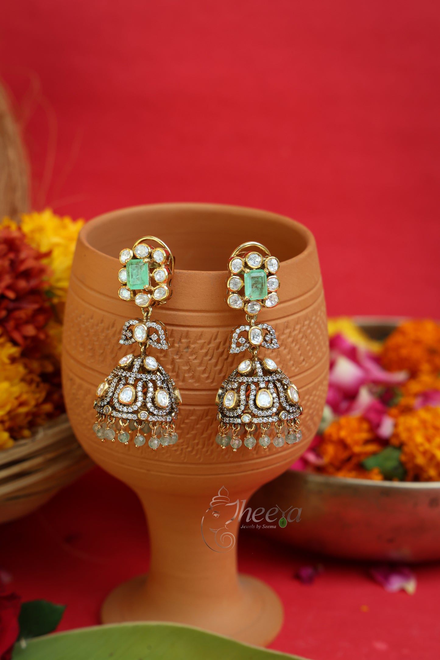 Close-up detailing of Afsana Spark Mint Square Jhumka highlighting Moissanite craftsmanship.