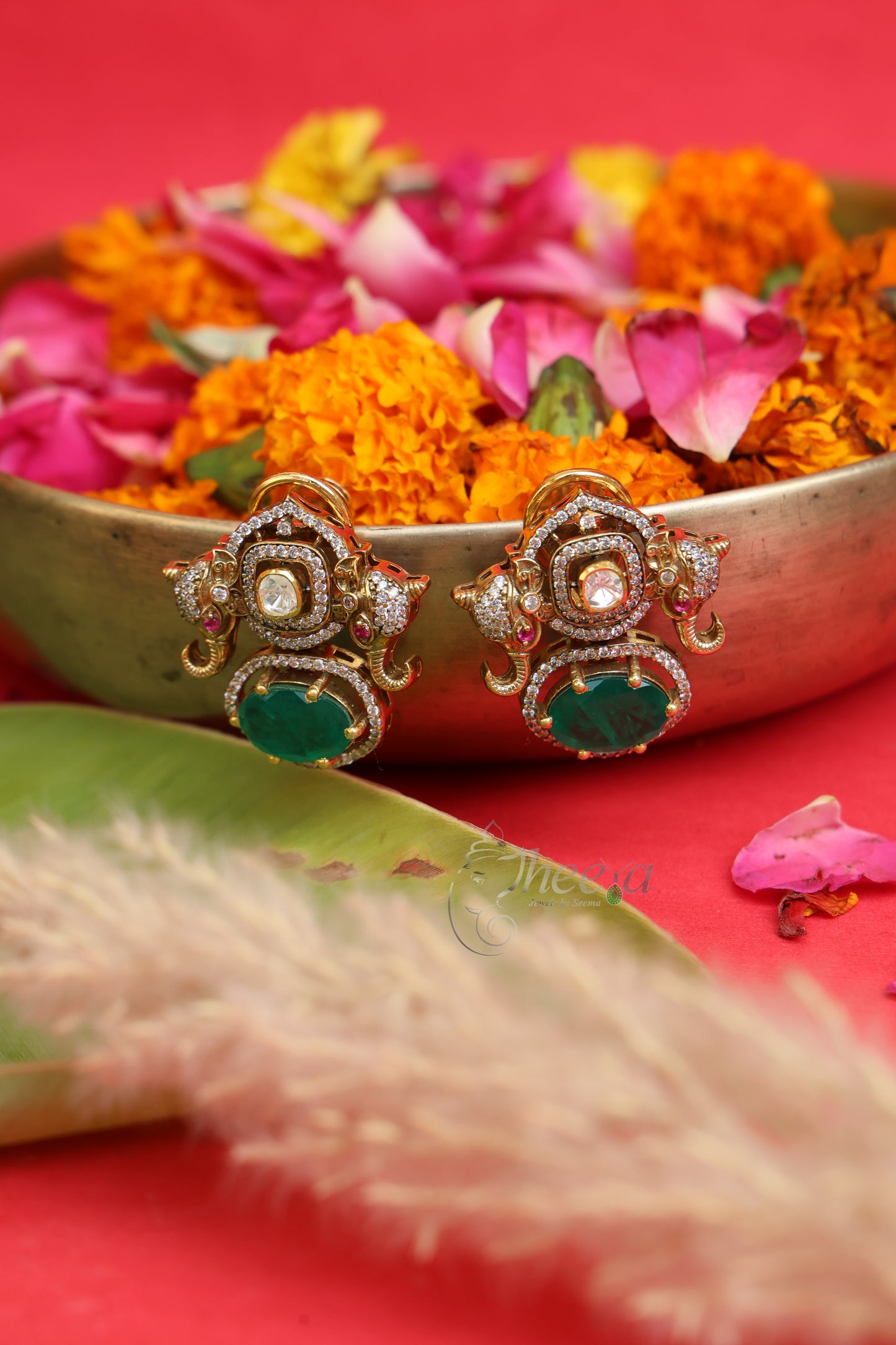 Mrigaya Green Elephant Moissanite Studs worn by a model showcasing scale and Earrings design.