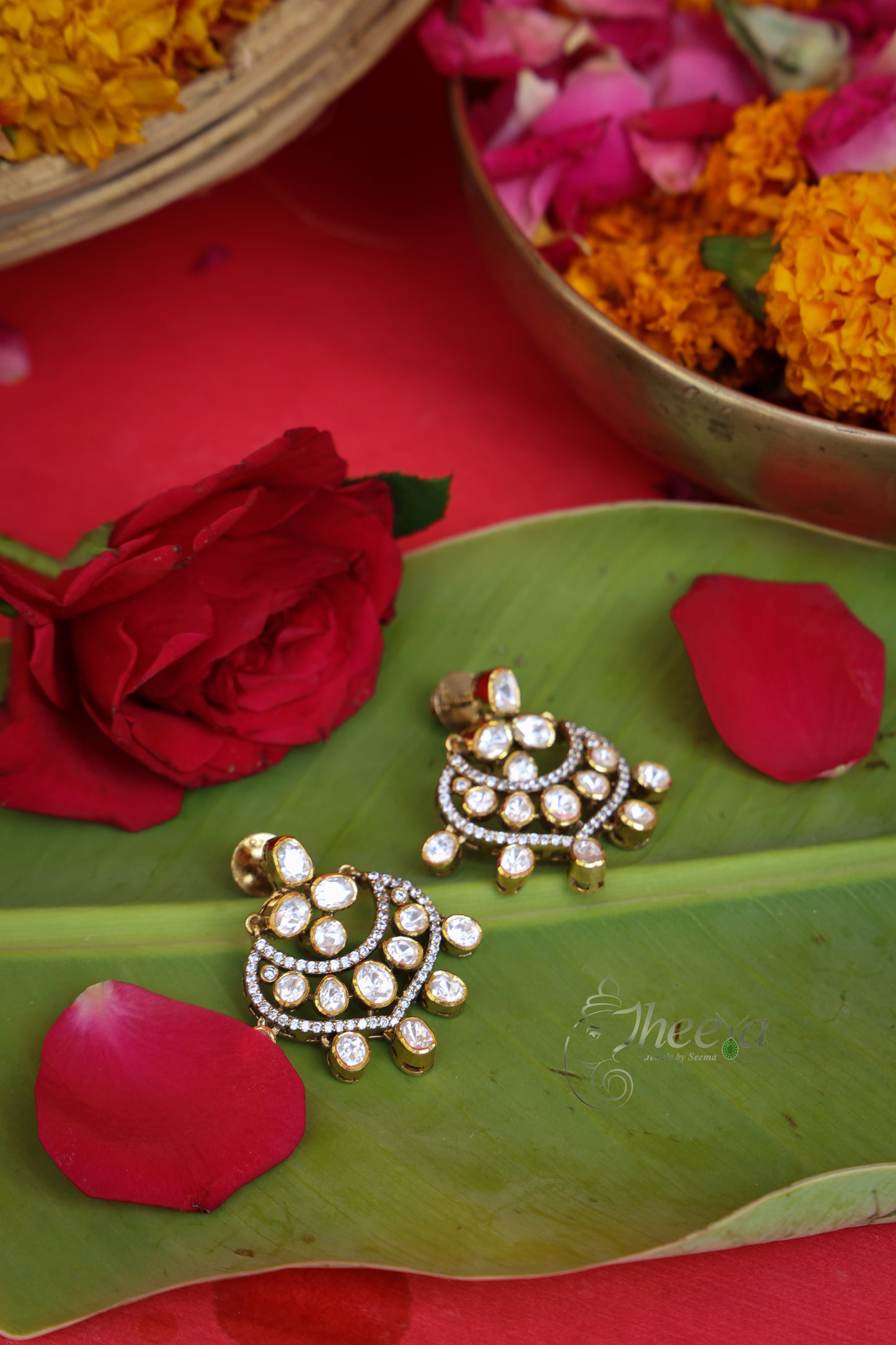 Surmai Studs Moissanite With Drops worn by a model showcasing scale and Earrings design.
